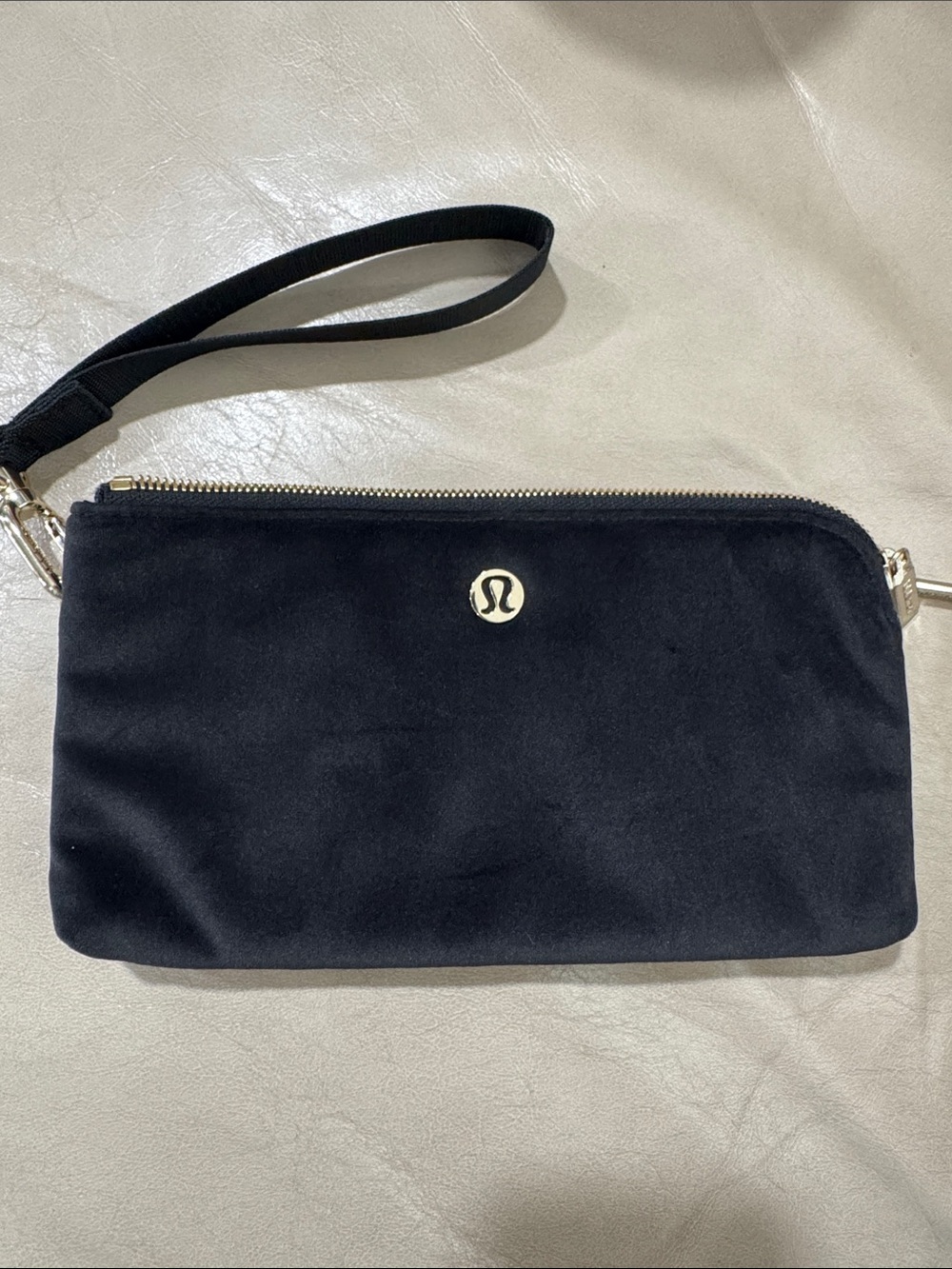 lululemon athletica Black Wristlet with Gold Logo Accent